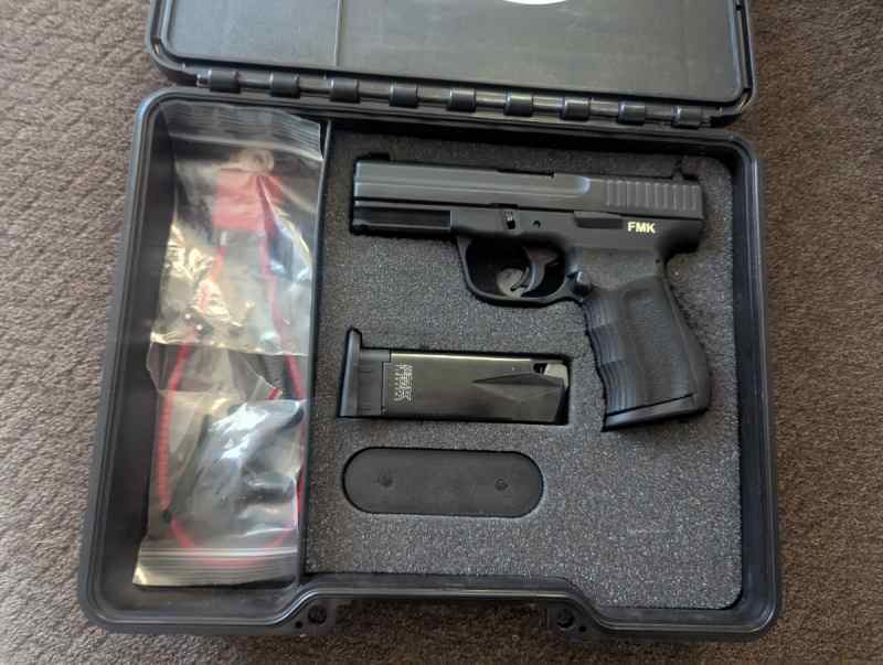 Fmk with 2 mags &amp; box