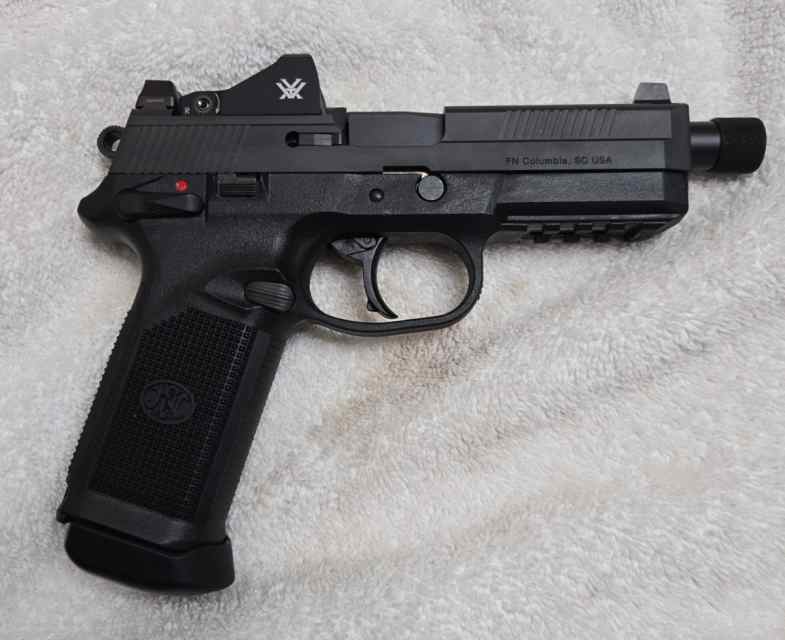 Fnx tactical 45 and FN tactical 22. Both unfired